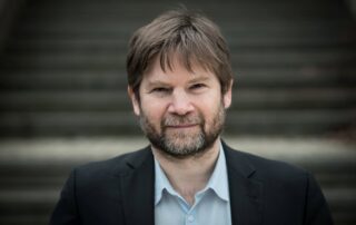 Vojtěch Kotecký vede v Centru UK spolupráci s firmami a veřejnou správou na environmentálních inovacích. Foto: Anna Šolcová